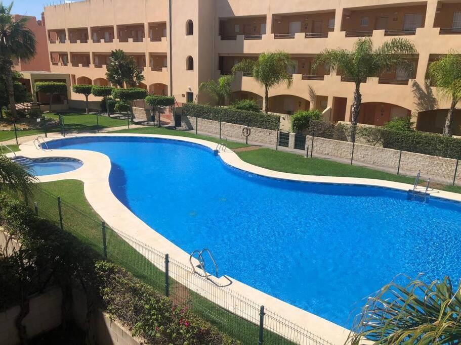 Appartement Bajo Con Jardin A Pie De Playa Y Piscina Comunitaria Con Jacuzzi à Playas de Vera Extérieur photo